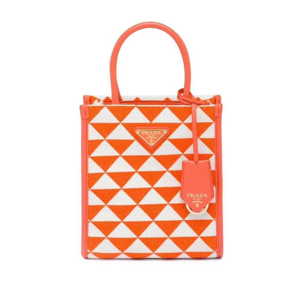 Prada
Symbole embroidered mini bag

NWT + dust bag!!